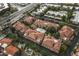 Aerial view of a community with multiple swimming pools and well-maintained landscaping at 8653 E Royal Palm Rd # 1006, Scottsdale, AZ 85258