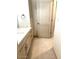 A bathroom featuring modern vanity, tile floor, and lighting at 8653 E Royal Palm Rd # 1006, Scottsdale, AZ 85258