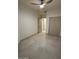 Bedroom with tile flooring, ceiling fan, and sliding closet doors at 8653 E Royal Palm Rd # 1006, Scottsdale, AZ 85258