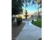 Water fountain is surrounded by greenery and landscaping at 8653 E Royal Palm Rd # 1006, Scottsdale, AZ 85258