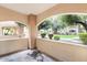 Open patio overlooking lush green landscape at 8653 E Royal Palm Rd # 1006, Scottsdale, AZ 85258