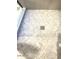 Close up of new shower floor with herring bone tile and drain at 8653 E Royal Palm Rd # 1006, Scottsdale, AZ 85258