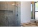 Luxurious bathroom featuring a glass shower, marble tile, and sleek fixtures, creating a modern spa-like experience at 9440 N 57Th St, Paradise Valley, AZ 85253