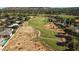 Picturesque aerial view of a golf course winding through a luxury home community and desert landscape at 9440 N 57Th St, Paradise Valley, AZ 85253