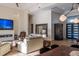 Bright and airy living room with hardwood floors, a cozy fireplace, and stylish contemporary furnishings at 9440 N 57Th St, Paradise Valley, AZ 85253