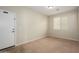 Neutral bedroom with standard window and door perfect for an office or guest room at 10219 E Isleta Ave, Mesa, AZ 85209