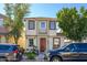 Attractive two-story home with a light stucco facade, complementary brown trim, and a small front balcony at 10219 E Isleta Ave, Mesa, AZ 85209