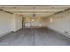 Attached garage features washer, dryer hookups, and storage cabinets at 10509 W Oak Ridge Dr, Sun City, AZ 85351