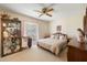 Cozy bedroom with natural light and neutral decor at 10611 W Camelot Cir, Sun City, AZ 85351