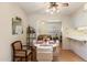 Comfortable dining area with ample seating, natural light, and easy access to living area and kitchen at 10611 W Camelot Cir, Sun City, AZ 85351