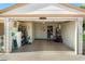 Spacious and well-organized two-car garage with ample storage space and a clean, uncluttered appearance at 10611 W Camelot Cir, Sun City, AZ 85351