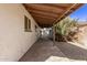 Covered patio with concrete flooring that offers a shaded outdoor space, perfect for relaxation at 113 W Rawhide Ave, Gilbert, AZ 85233