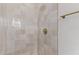 Modern shower featuring neutral tile work, updated fixtures, and gold hardware at 113 W Rawhide Ave, Gilbert, AZ 85233