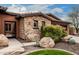 Attractive home with a stone accent wall, desert landscaping, and inviting entryway at 12129 W Desert Mirage Dr, Peoria, AZ 85383