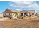 Charming single-story home boasts desert landscaping, stone accents, and a well-manicured front yard at 13729 E Rancho Laredo Dr, Scottsdale, AZ 85262