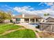 Beautiful backyard featuring a private pool, hot tub, and outdoor lounge area, perfect for entertaining at 14402 N Silverado Dr, Fountain Hills, AZ 85268