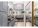 Bright bathroom featuring a chandelier, double sinks, and a soaking tub at 14402 N Silverado Dr, Fountain Hills, AZ 85268