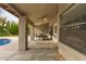 Covered patio with tile floor and outdoor seating, perfect for entertaining at 14402 N Silverado Dr, Fountain Hills, AZ 85268