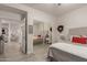 Modern bedroom with a mirrored closet, comfortable textures, and neutral colors at 15050 N Thompson Peak Pkwy # 1006, Scottsdale, AZ 85260