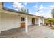 Spacious covered patio, complete with a built-in cabinet, making it perfect for outdoor entertaining and relaxation at 1509 W Tuckey Ln, Phoenix, AZ 85015