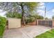 Gated and paved backyard storage area with storage shed at 1509 W Tuckey Ln, Phoenix, AZ 85015