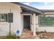 Charming home entrance with stone pathway, well-maintained landscaping, and stylish front door at 1509 W Tuckey Ln, Phoenix, AZ 85015