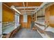 Large storage room with pegboard walls, shelving, and ample workspace at 1509 W Tuckey Ln, Phoenix, AZ 85015