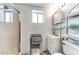 Bright bathroom with a glass-enclosed shower, vanity with storage, and modern fixtures at 17200 W Bell Rd # 866, Surprise, AZ 85374