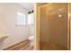 Bathroom showcasing modern fixtures, cabinet storage, and glass-enclosed shower at 1721 W Weldon Ave, Phoenix, AZ 85015