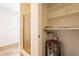 Bathroom featuring a shower with a glass door next to a closet at 1721 W Weldon Ave, Phoenix, AZ 85015