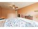 Bedroom featuring a ceiling fan, hardwood floors, and ample natural light at 1721 W Weldon Ave, Phoenix, AZ 85015