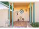 A welcoming front porch with a decorative stained glass window above the home's address at 1721 W Weldon Ave, Phoenix, AZ 85015