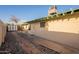 Exterior of the home with shed and walkway lined with decorative rock at 1721 W Weldon Ave, Phoenix, AZ 85015