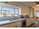 Vintage kitchen featuring tile countertops, stainless steel appliances, and an abundance of cabinet space at 1721 W Weldon Ave, Phoenix, AZ 85015