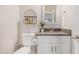 Contemporary half-bathroom featuring modern fixtures, a sleek vanity, and stylish decor at 1841 E Clarendon Ave, Phoenix, AZ 85016