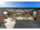 Inviting covered picnic area with tables, perfect for outdoor gatherings and community events at 18938 W Luke Ave, Litchfield Park, AZ 85340