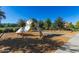 Community playground offering a variety of slides, swings, and climbing structures for children at 18938 W Luke Ave, Litchfield Park, AZ 85340