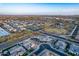 Aerial view of a well-planned community showcasing tree-lined streets and beautiful homes at 21397 S 215Th Way, Queen Creek, AZ 85142