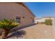 Paver patio and desert landscaping provide a relaxed outdoor living space in the backyard at 2142 E Wildhorse Dr, Chandler, AZ 85286