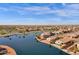 Community aerial view showcasing waterfront properties and neighborhood amenities at 21609 N Diamond Dr, Maricopa, AZ 85138