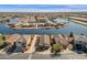 Aerial view of waterfront homes showcasing community layout and water access at 21609 N Diamond Dr, Maricopa, AZ 85138