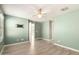 Bedroom featuring a ceiling fan, tile floors, and neutral walls at 2204 W Minton St, Phoenix, AZ 85041