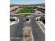 A neighborhood entrance showcasing a green space and community gathering area at 2204 W Minton St, Phoenix, AZ 85041