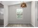 Dining area with a decorative pendant light fixture at 2204 W Minton St, Phoenix, AZ 85041