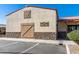 Community building featuring decorative signage and stone facade, including dedicated parking at 2263 N Trekell Rd # 113, Casa Grande, AZ 85122