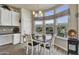 Charming dining area with bright windows and a stylish light fixture. Ready for Gathering meals at 2263 N Trekell Rd # 113, Casa Grande, AZ 85122