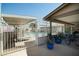 Relaxing community pool area with lounge chairs, shaded areas, and lush landscaping, providing a tranquil retreat at 2528 E Mckellips Rd # 74, Mesa, AZ 85213