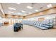 A spacious auditorium is shown with a piano, organ, and rows of chairs on an elevated platform at 2608 Leisure World --, Mesa, AZ 85206