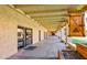 Exterior of a hallway leading to the Billiards room with a sign and trimmed plants at 2608 Leisure World --, Mesa, AZ 85206