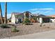 Beautifully landscaped home with desert landscaping, mature trees and a three car garage at 2608 Leisure World --, Mesa, AZ 85206